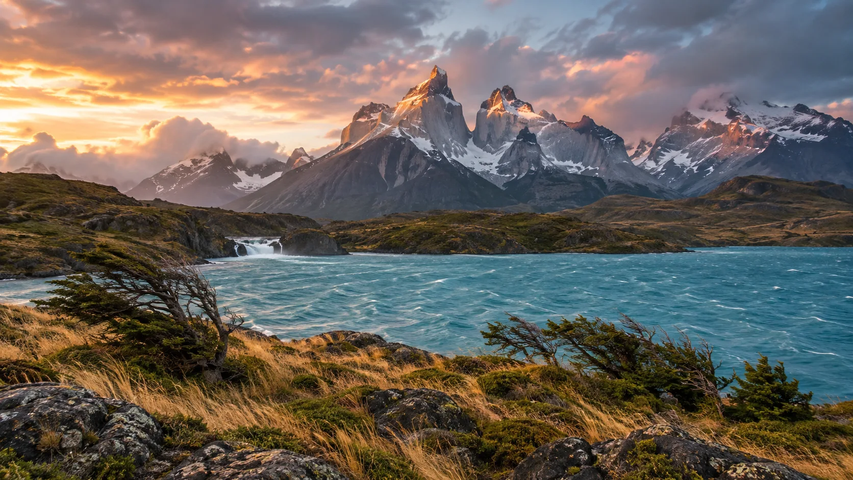 Turquoise Lake Pehoé and the granite Cuernos at sunrise in Torres del Paine National Park, Chile.