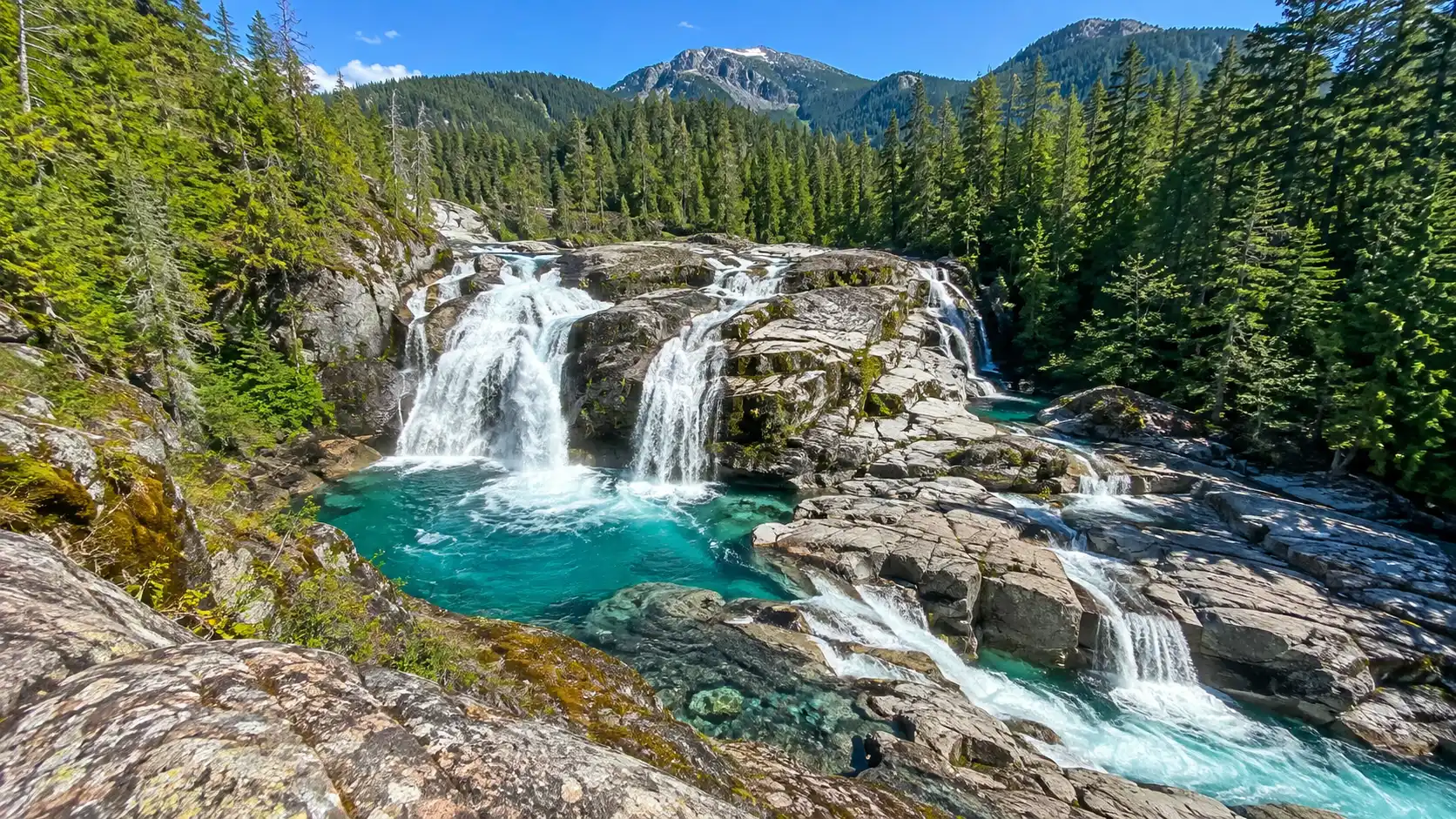 Lower Myra Falls cascading into turquoise pools in Strathcona Provincial Park