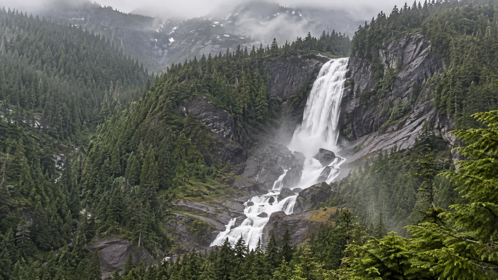 Upper Myra Falls descending a remote forested mountainside on Vancouver Island