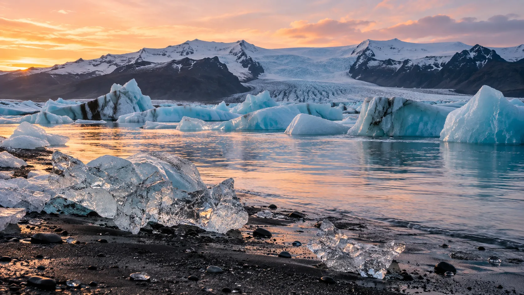 Blue icebergs float before a glacier tongue at Jökulsárlón in Vatnajökull National Park, Iceland.